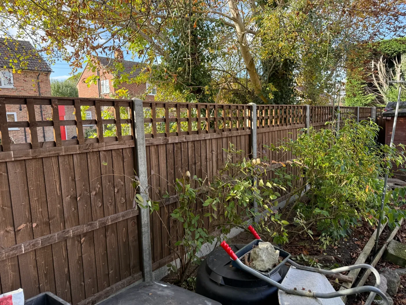 Fencing contractors installing a timber fence in Guildford