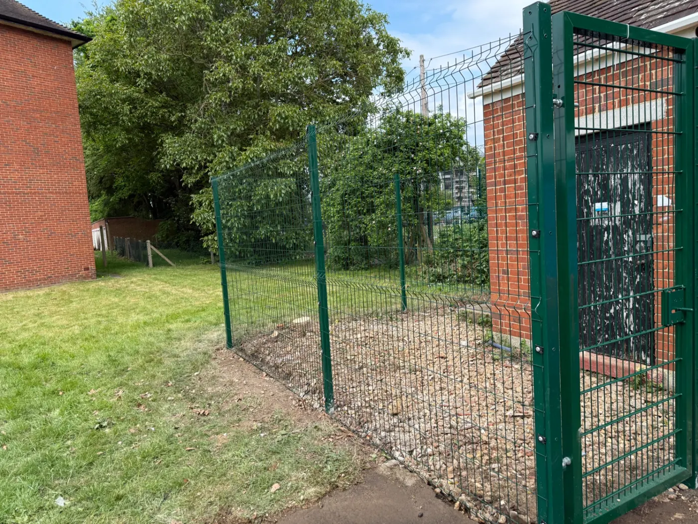 V-mesh commercial security fencing with a lockable gate in Surrey