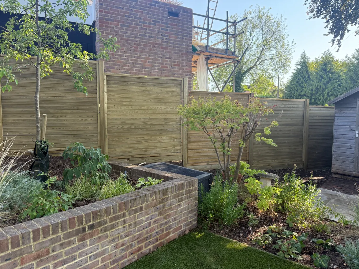Modern horizontal panel garden fencing completed in Guildford