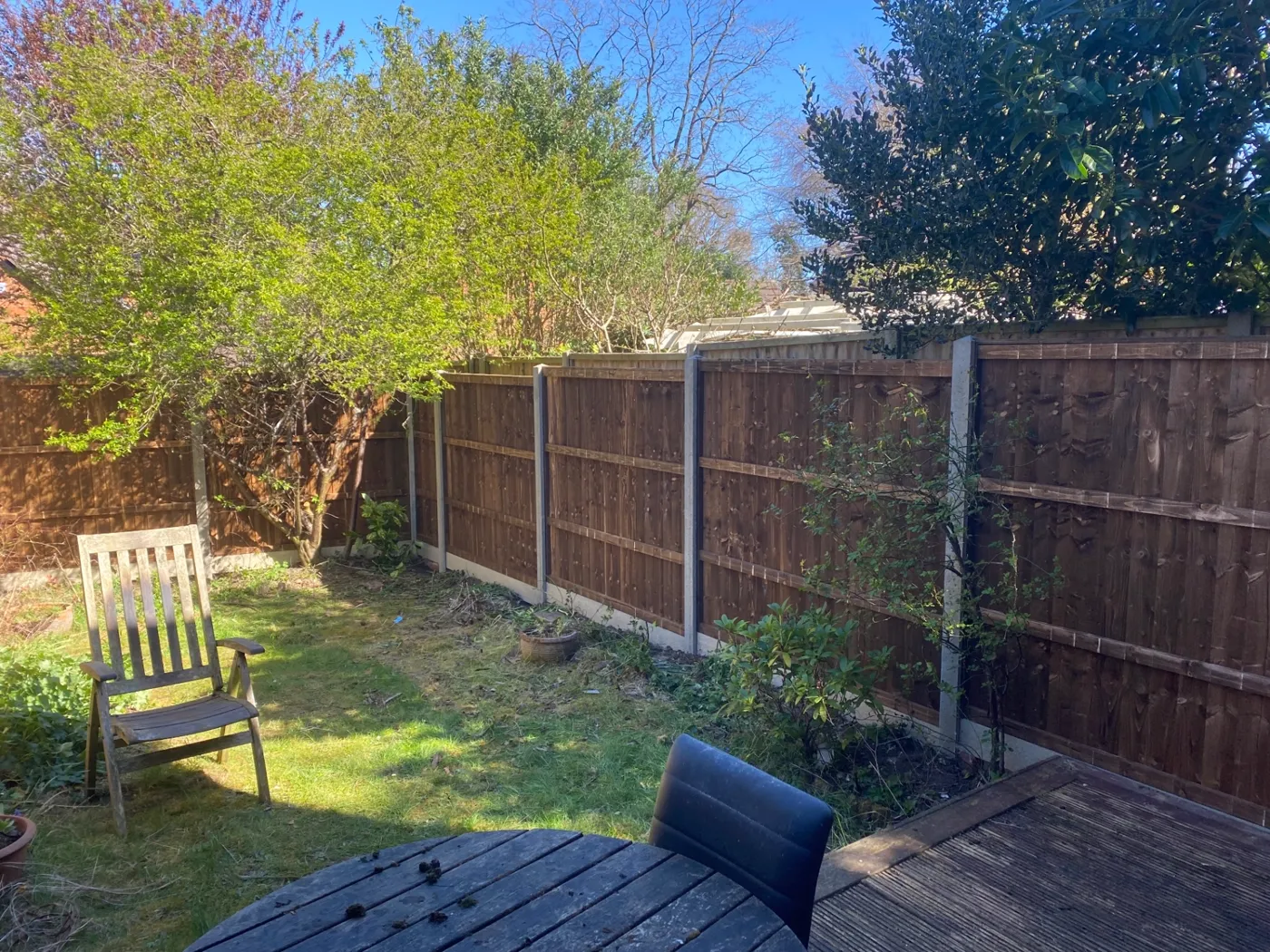 Replacement closeboard fencing installed around a rear garden in Guildford